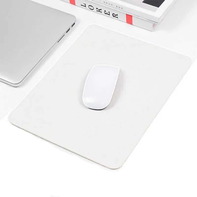 FanzyMarket PU leather mouse pad with non-slip, waterproof, and anti-scratch surface for PC, laptop, and gaming desks.