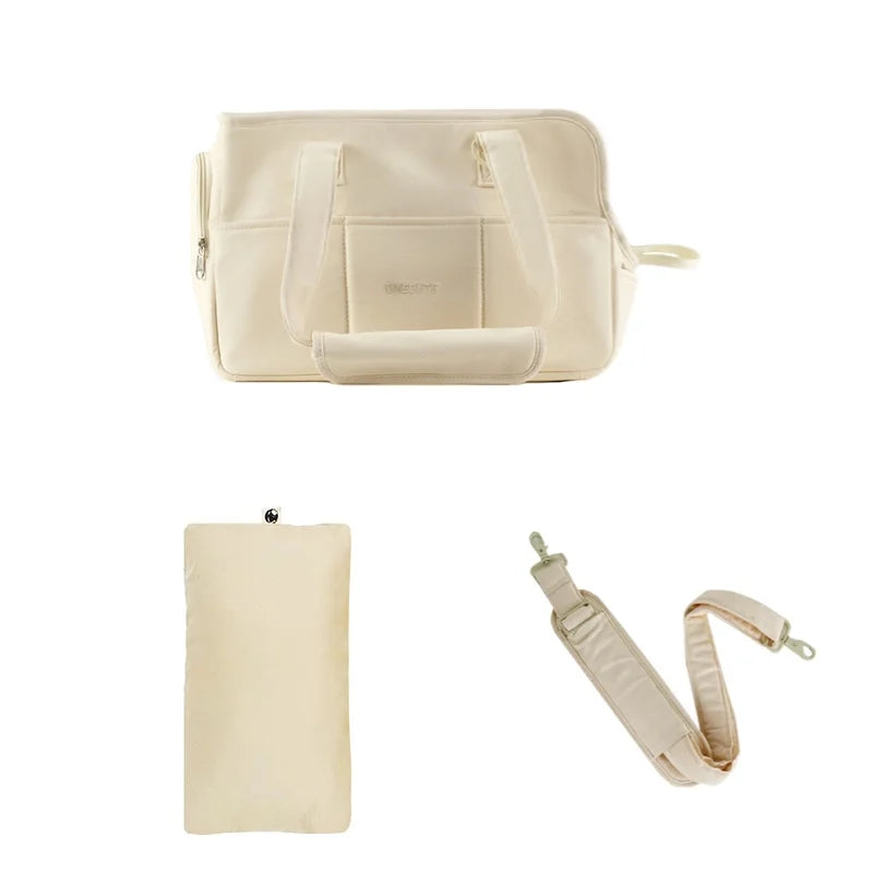 FanzyMarket portable cotton pet sling carrier for small dogs and cats, shown in medium size with shoulder strap and fabric material.