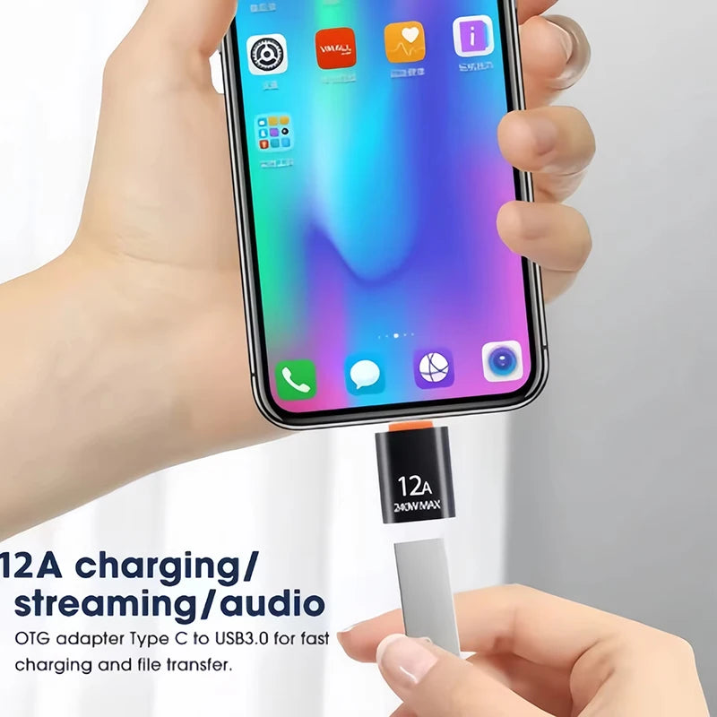 USB-C OTG adapter in use with smartphone for charging and audio