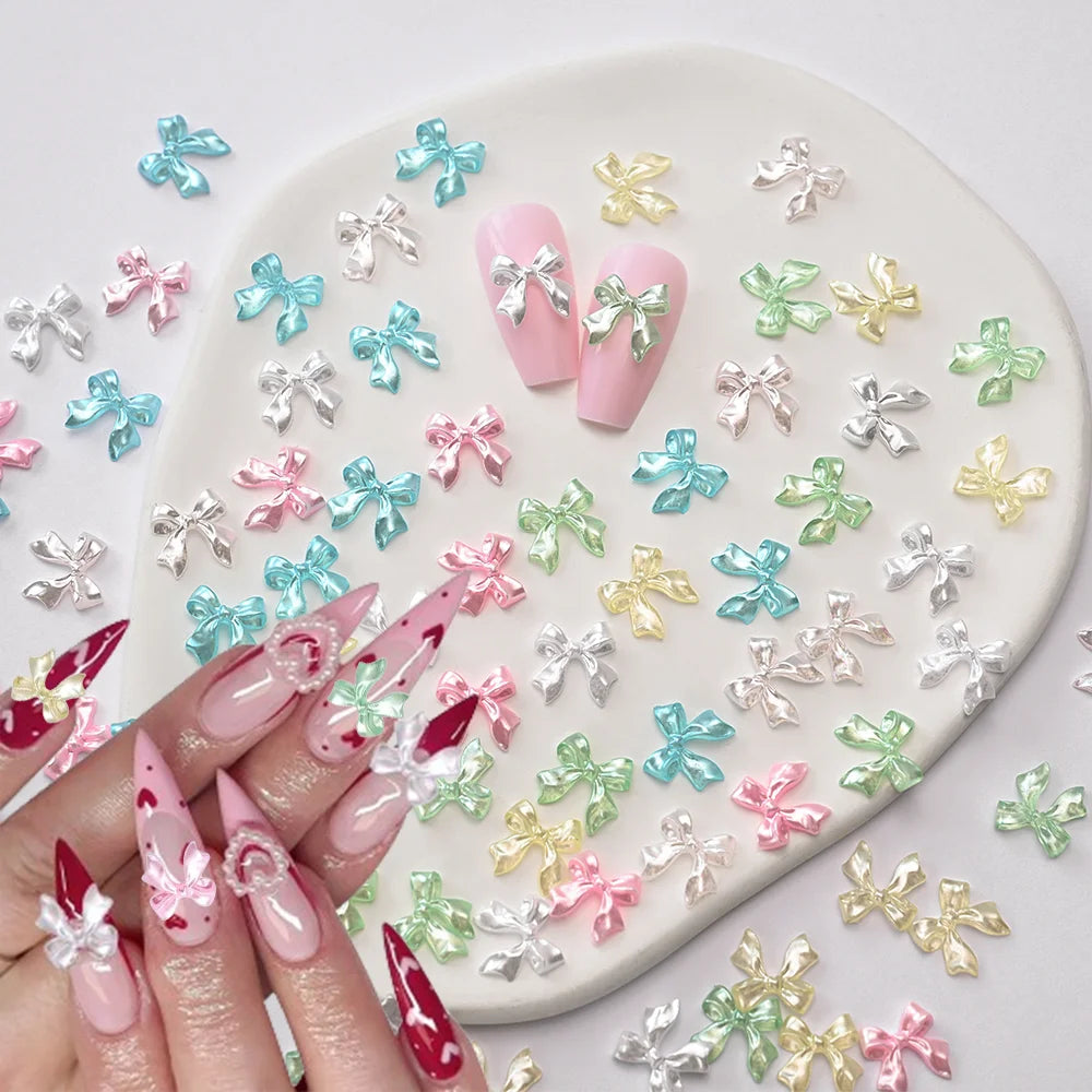 100-Pack 3D Pink Pearlescent Resin Bow Nail Charms — Flat Back Bowknot Nail Art Decorations for DIY Manicure