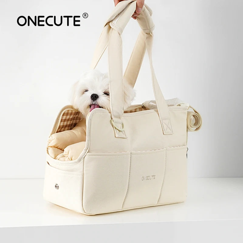 FanzyMarket portable cotton pet sling carrier for small dogs and cats, shown in small and medium sizes with shoulder straps.