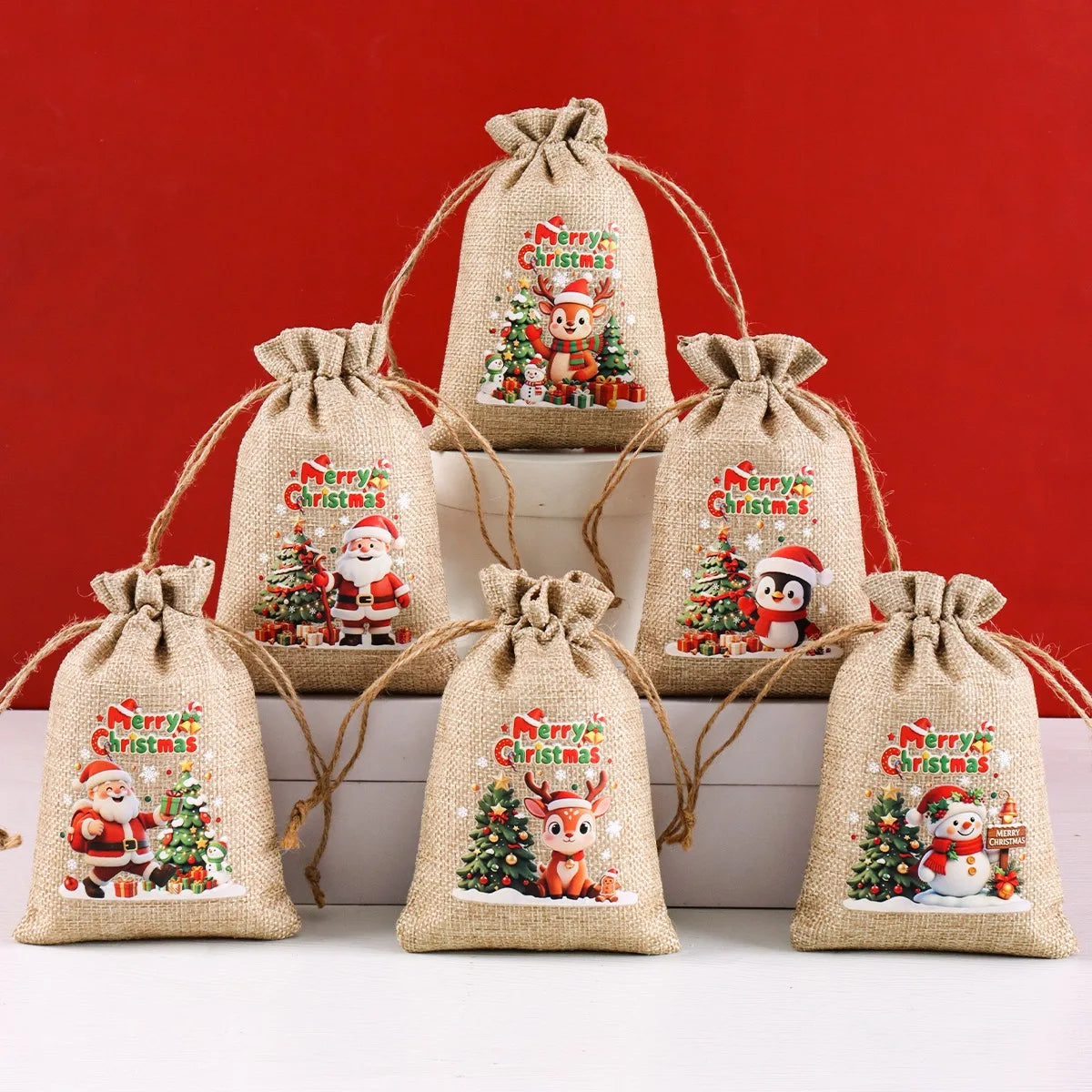 6-Pack Burlap Christmas Gift Bags with Santa & Reindeer Prints, Drawstring Jute Party Favor Bags