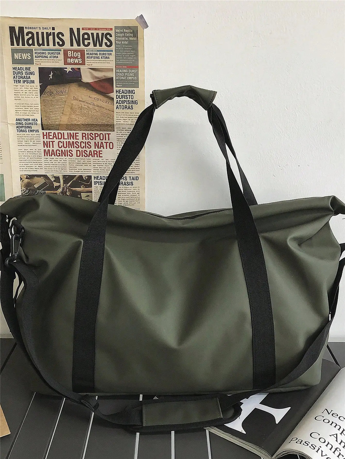 Gray FanzyMarket large capacity lightweight nylon travel and gym duffel bag with handheld, one-shoulder, and crossbody options.