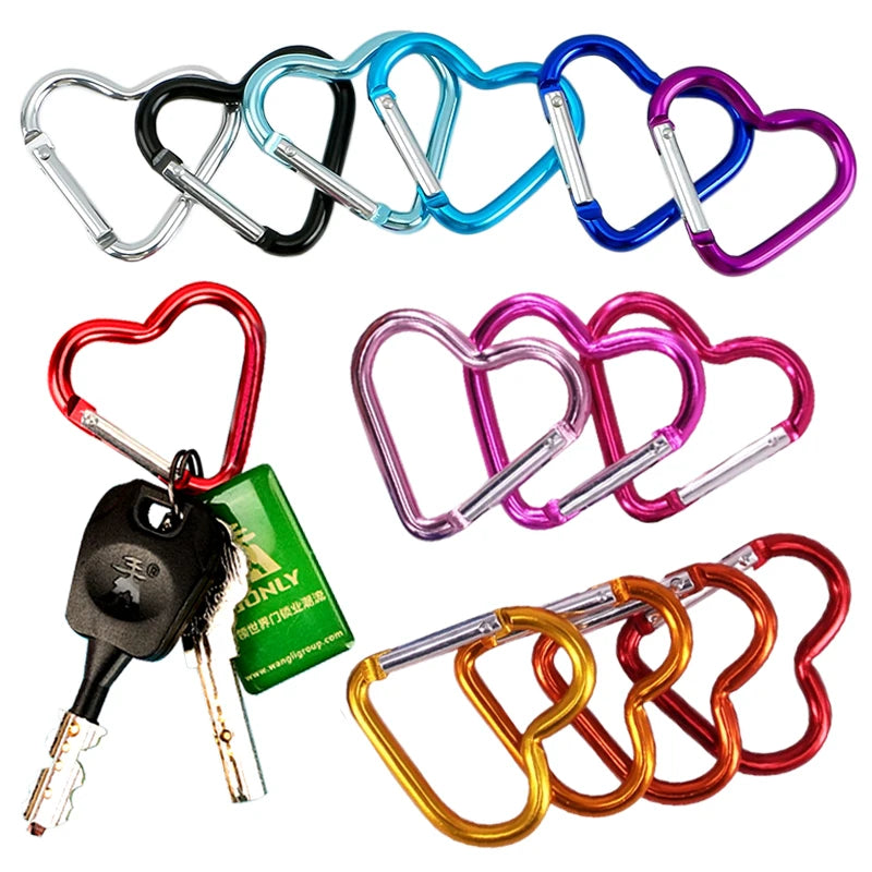 Silver heart-shaped aluminum carabiner keychain clip, perfect for keys, water bottles, and bags, by FanzyMarket.