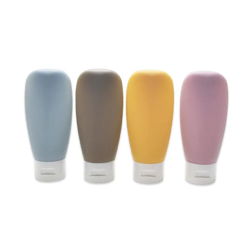 FanzyMarket refillable travel bottles set with four 60ml leakproof containers for shampoo, lotion, and cosmetics.