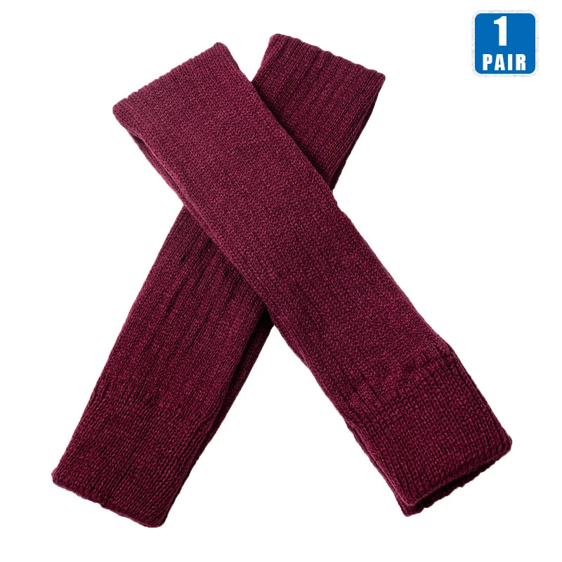 Black women's over-the-knee knit leg warmers with open heel, footless design, available in 27 and 36 inches, soft winter gaiters.