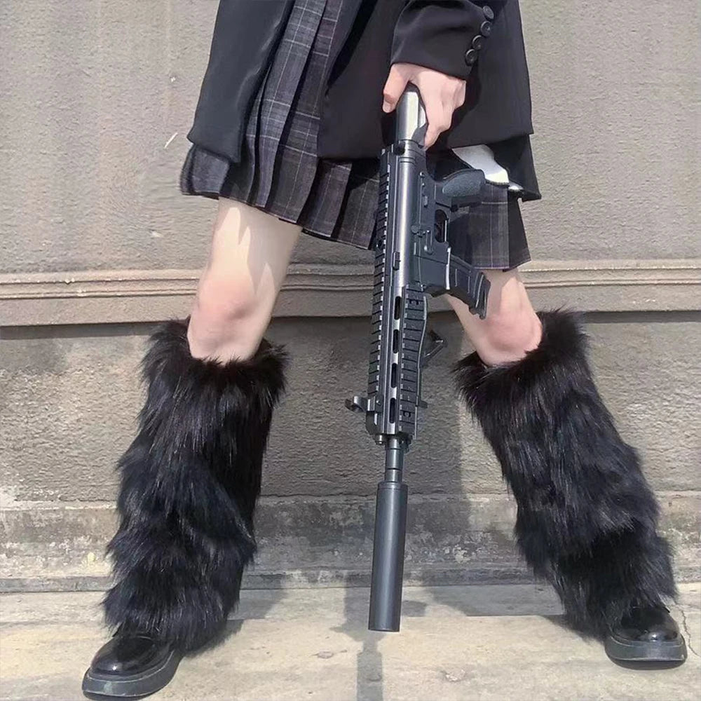 White faux fur leg warmers from FanzyMarket, Y2K goth knee-high boot covers, soft fur with black accents, one size fits most.