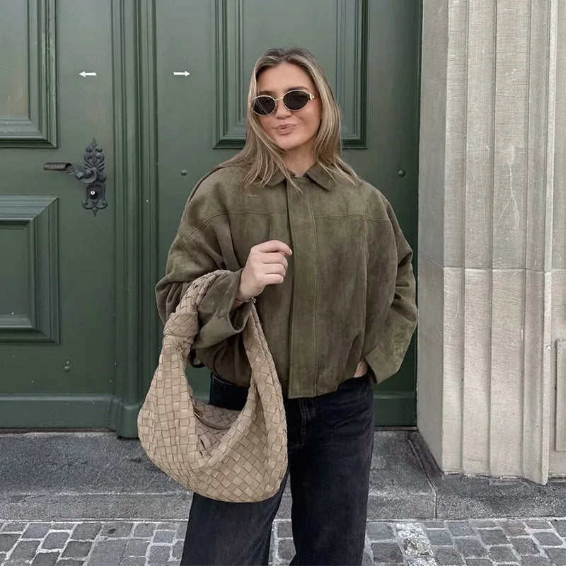 Women's vintage bomber jacket by FanzyMarket featuring a turn-down collar, long sleeves, and a loose fit outerwear style.