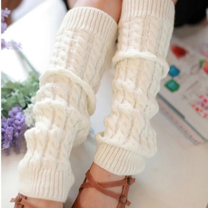 Black and white women's knit leg warmers with crochet detailing, 40 cm long, suitable for autumn and winter.