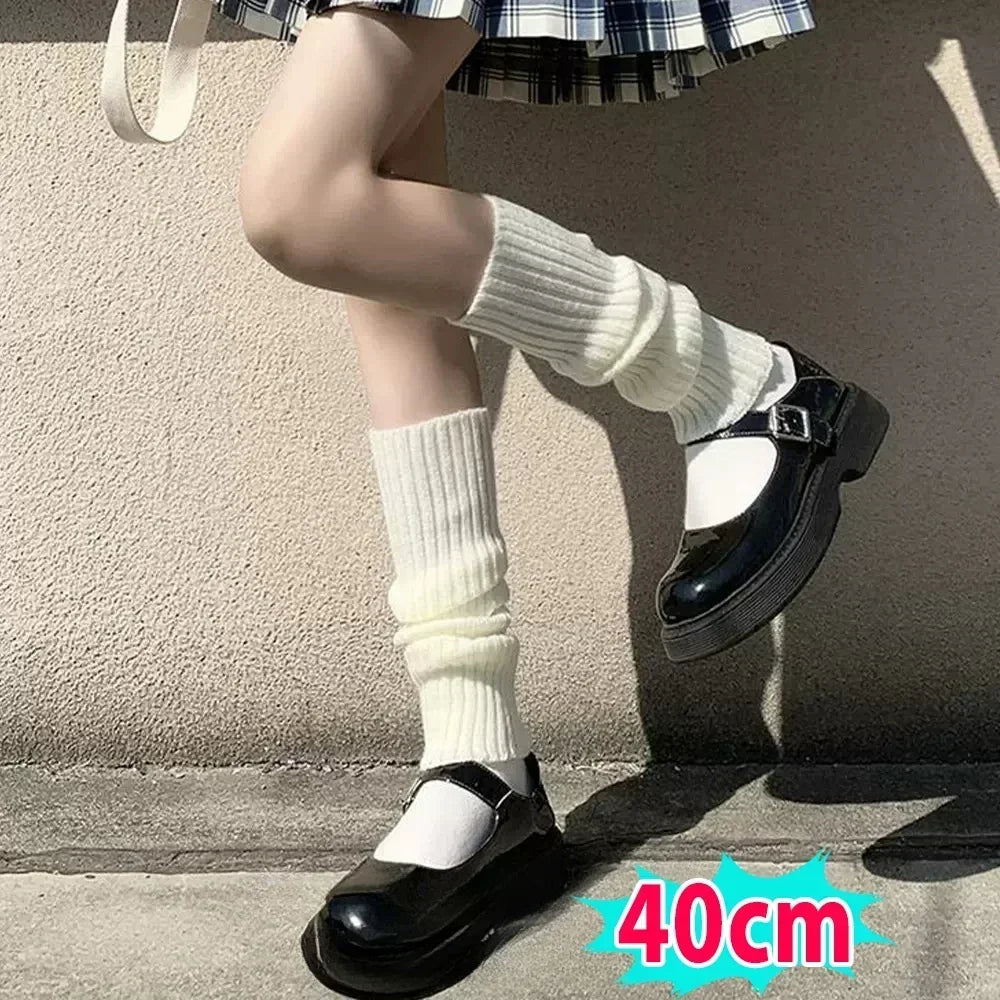 White and black Y2K fluffy knit leg warmers for women, Gothic Lolita arm and boot covers in various lengths, from FanzyMarket.