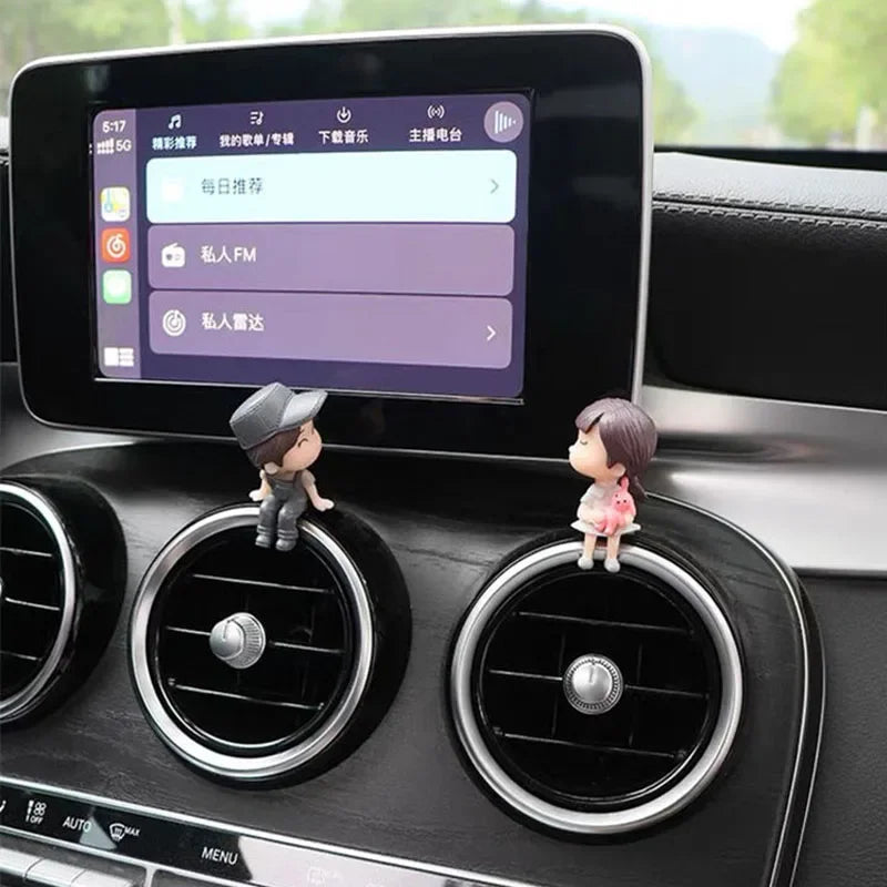 Cute cartoon couple car dashboard figurines by FanzyMarket, featuring romantic balloons for car interior decoration.