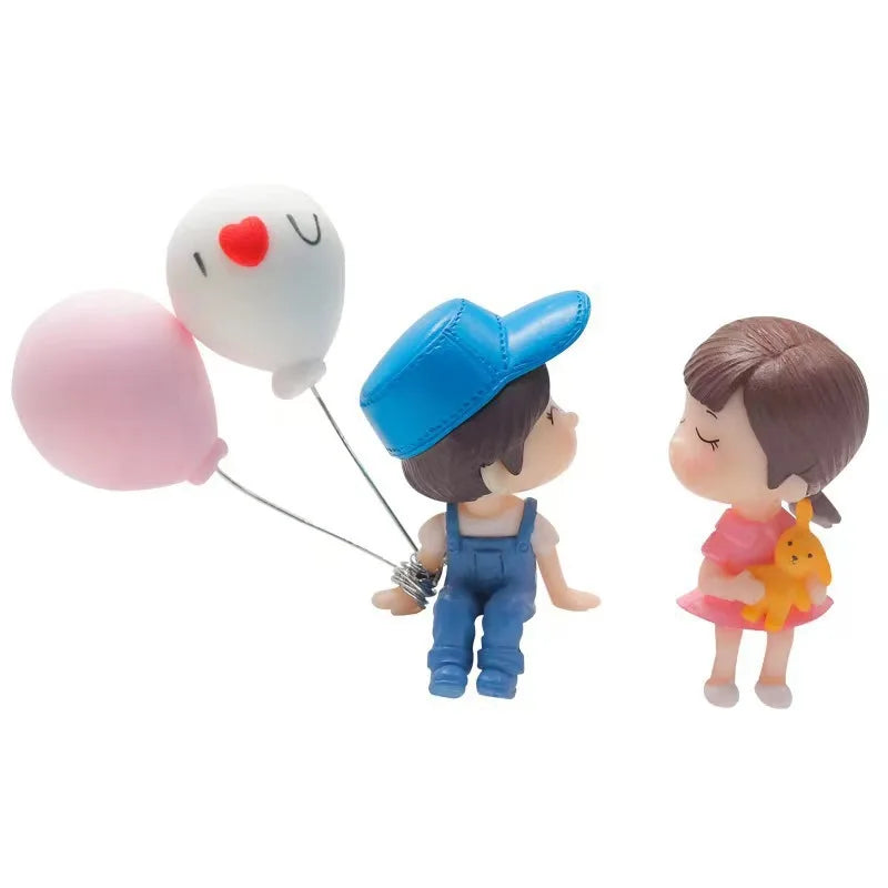 Cute cartoon couple car dashboard figurines by FanzyMarket, featuring romantic balloon ornaments for auto interior decor.