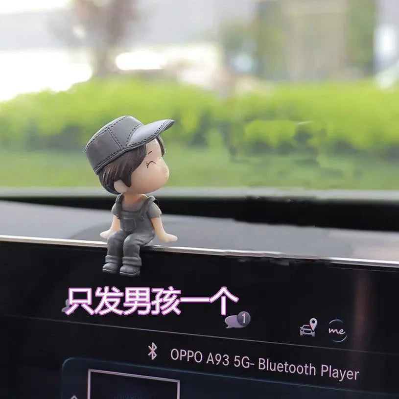 Cute cartoon couple car dashboard figurines with a romantic balloon ornament, perfect for FanzyMarket auto interior decor.