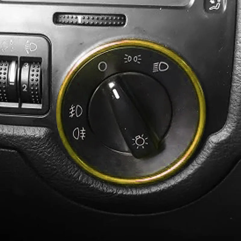 Silver metal headlight switch trim ring for car interior, fits Golf, Passat, Polo, by FanzyMarket, enhances switch appearance.