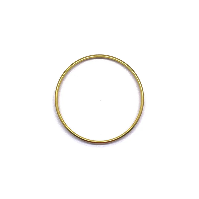 Silver metal headlight switch trim ring for car interior, fits Golf, Passat, Polo; enhances headlight switch appearance.