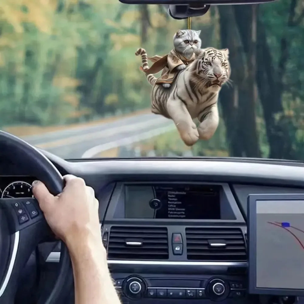 Cute cat-shaped rearview mirror ornament hanging inside a car, decorative pendant for auto interior by FanzyMarket.