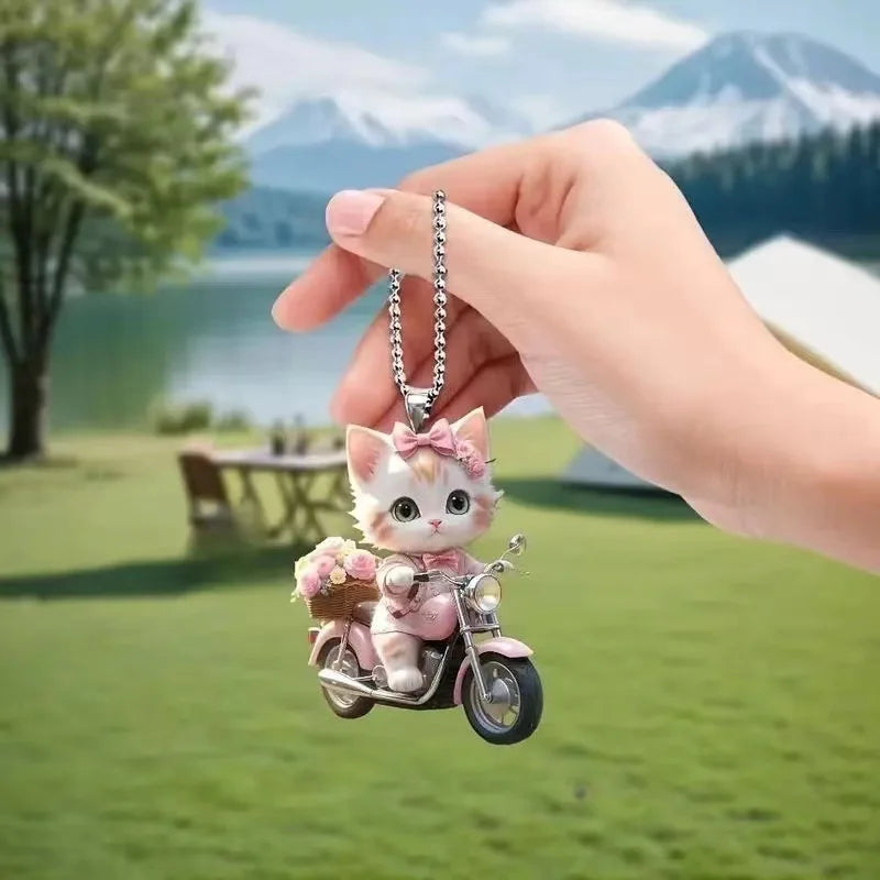 Cute cat-shaped rearview mirror ornament hanging from car interior, decorative pendant for auto interior decor by FanzyMarket