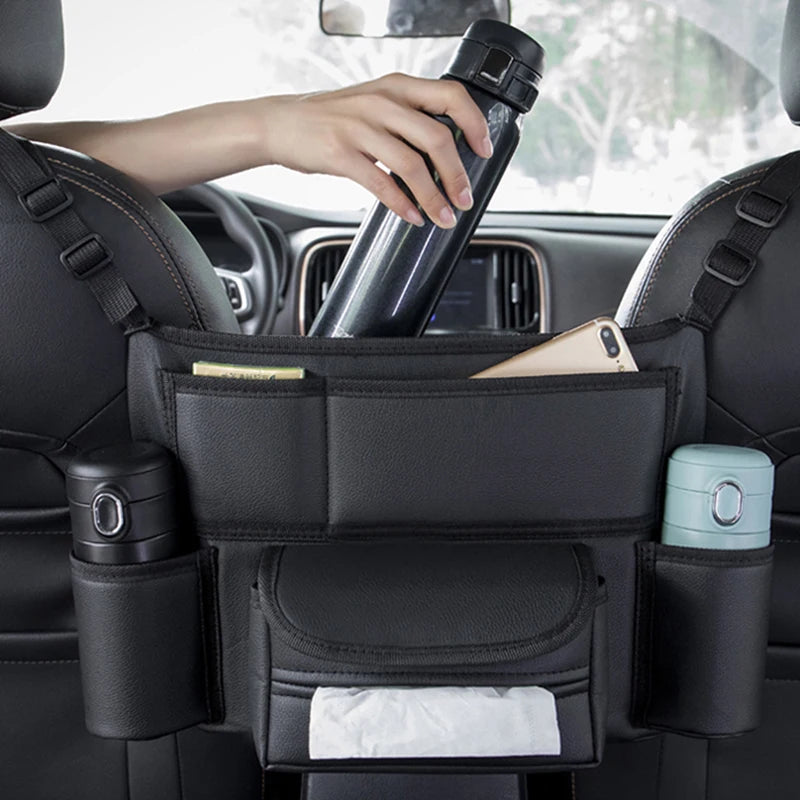 Leather car seat middle hanger organizer with large capacity, tissue and cup pockets, designed for auto interior storage by FanzyMarket.