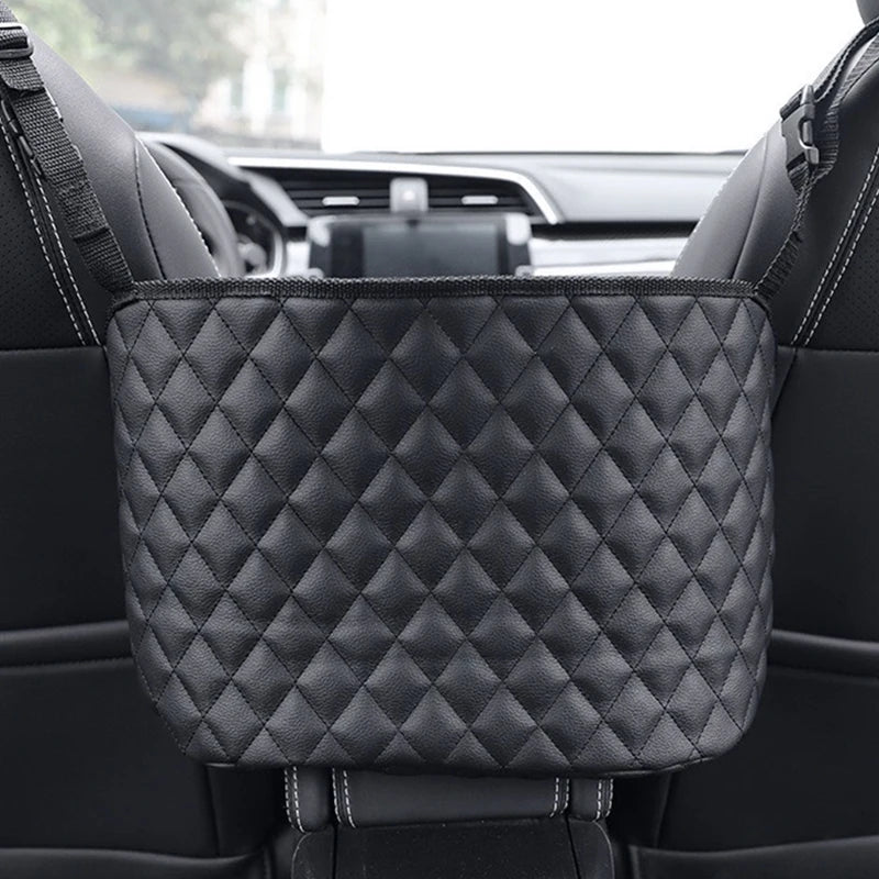 Leather car seat middle hanger organizer by FanzyMarket with large capacity, tissue and cup pockets, fits between car seats.