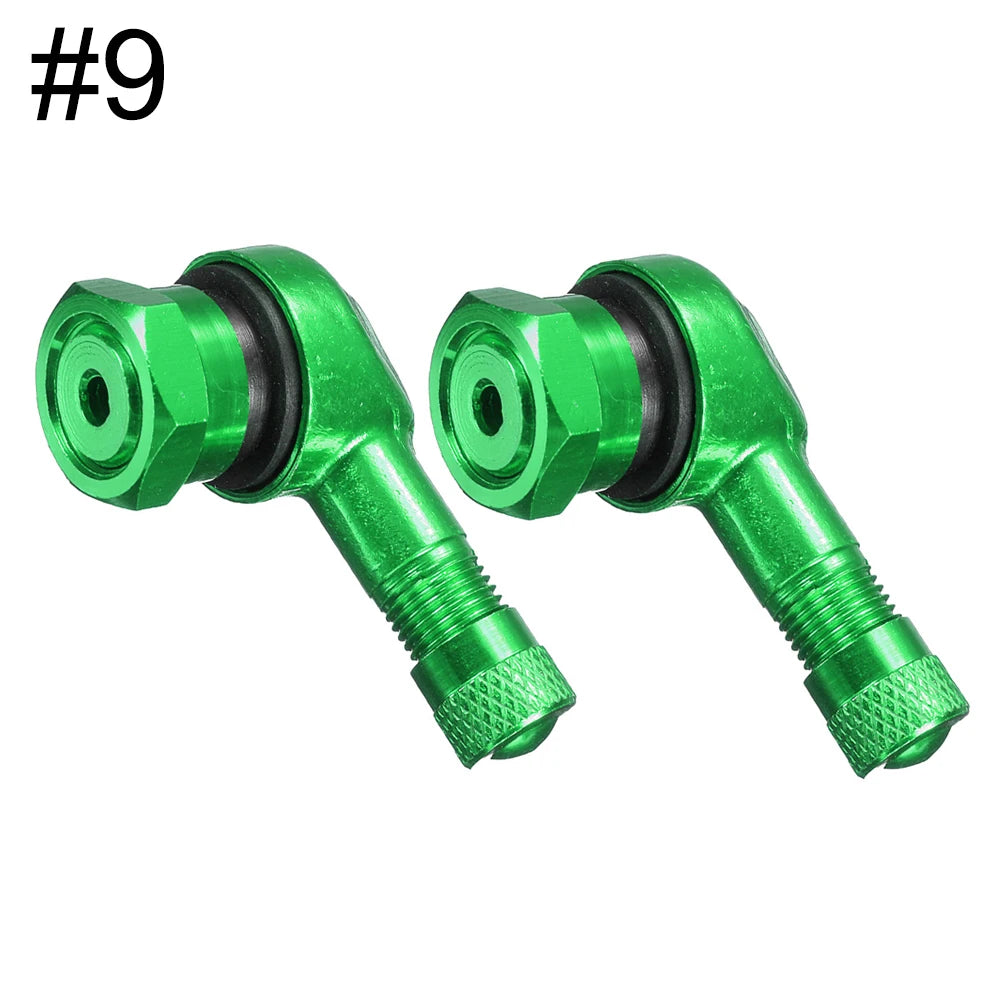 Two aluminum motorcycle tubeless valve stem caps in silver, designed for 90° valve stems, 11.3mm fit, by FanzyMarket.