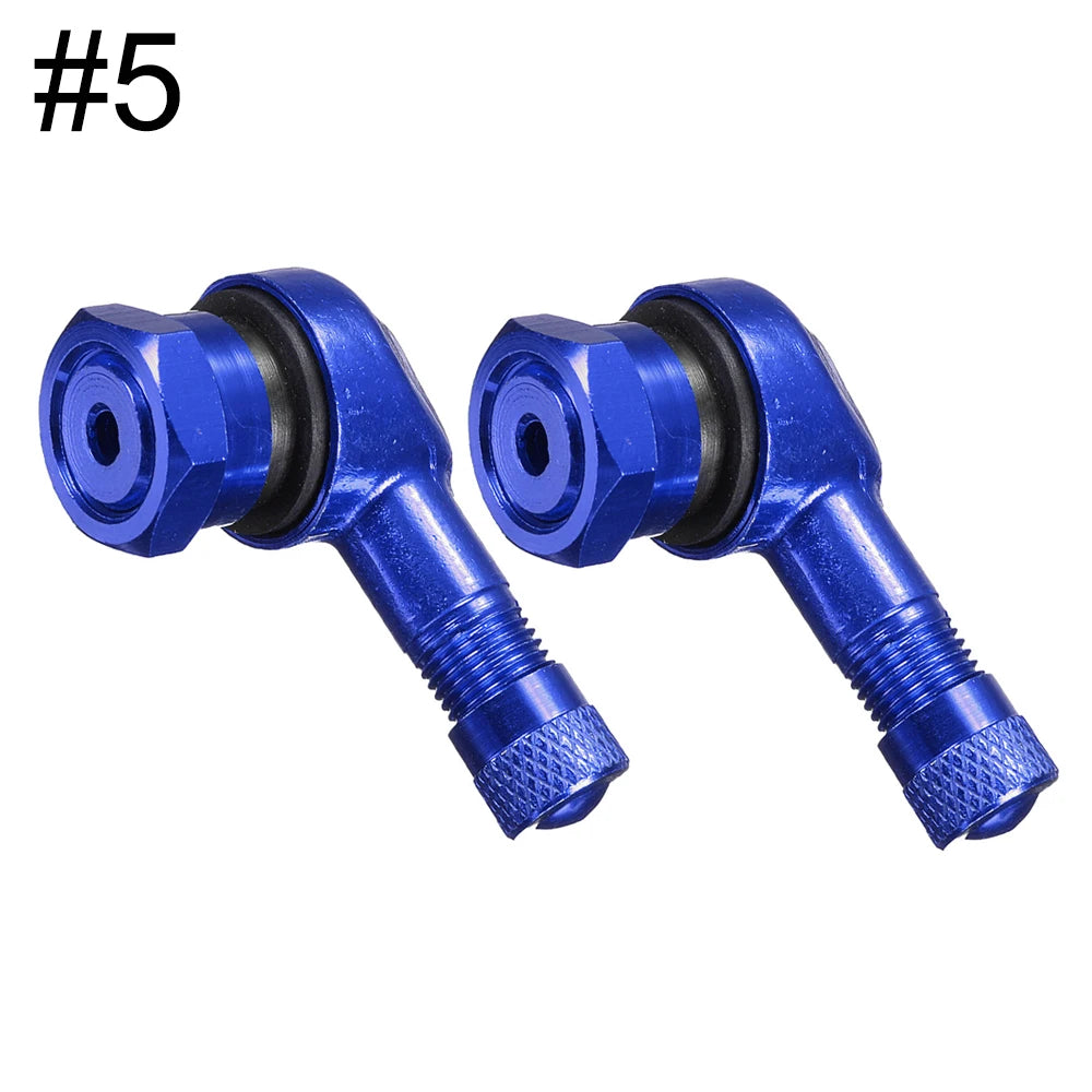 Two aluminum motorcycle tubeless valve stem caps in a 90-degree design, 11.3mm fit, shown on motorcycle valve stems.