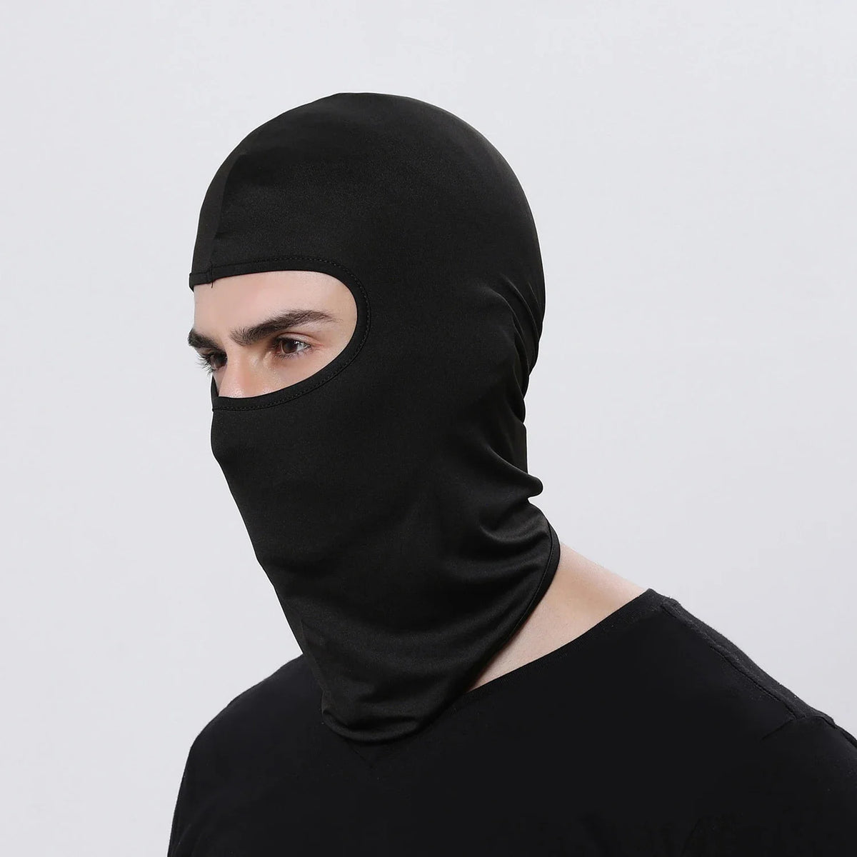 Red breathable motorcycle balaclava full-face mask by FanzyMarket, designed for motocross and motorbike riding, with hood and neck gaiter.