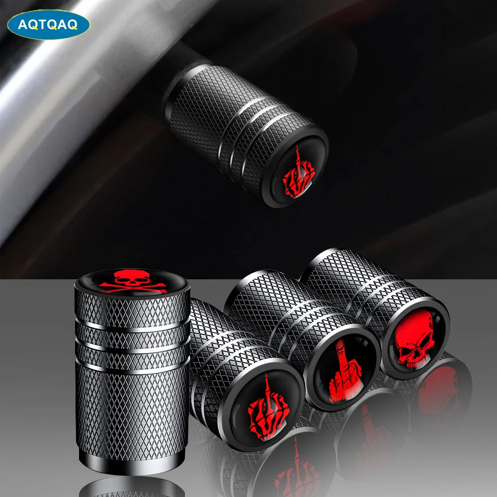 Set of four black aluminum tire valve stem caps for cars, bikes, and motorcycles, dustproof and universal fit.