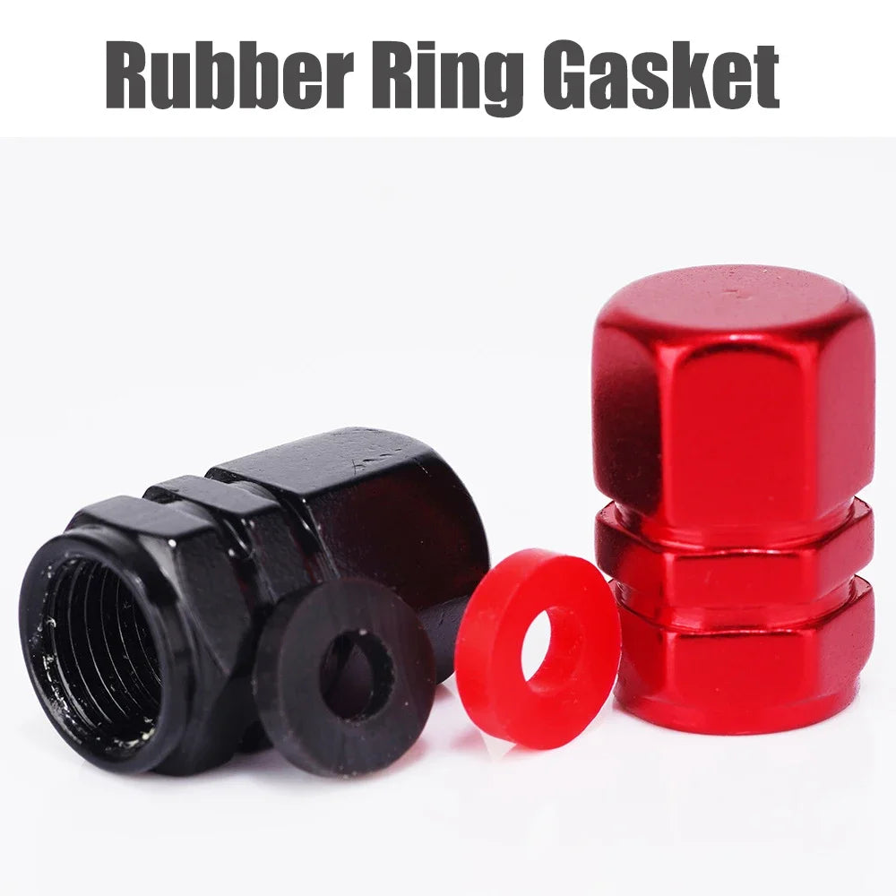 Red aluminum alloy tire valve stem caps for car, motorcycle, and bicycle, dustproof protective caps for wheels and tires.