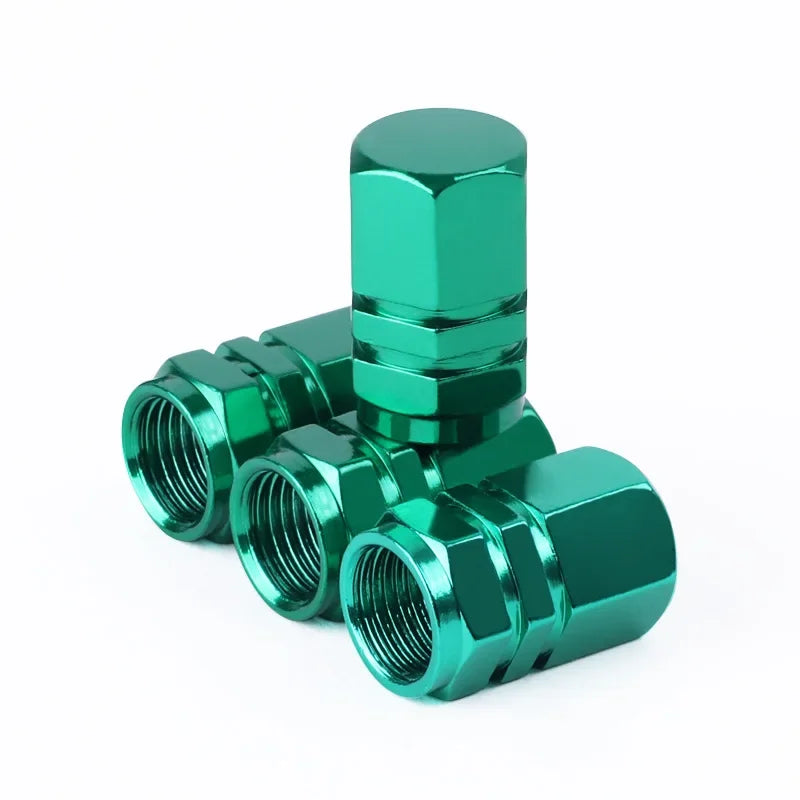 Red aluminum alloy tire valve stem caps for cars, motorcycles, and bicycles, dustproof and protective, 1.6 x 1.0 cm.