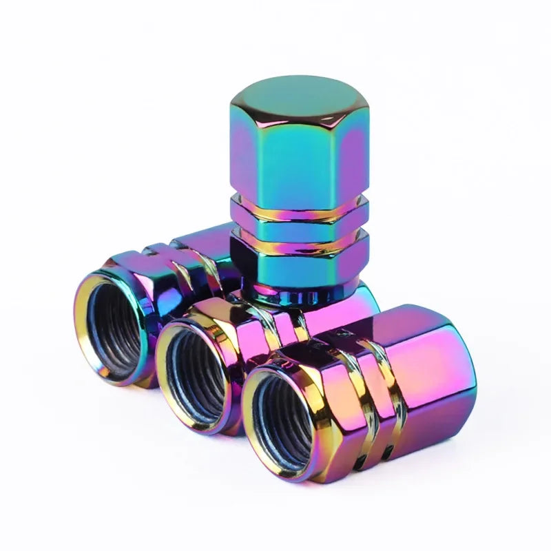 Red aluminum alloy tire valve stem caps for car, motorcycle, and bicycle, dustproof and durable exterior wheel accessories.