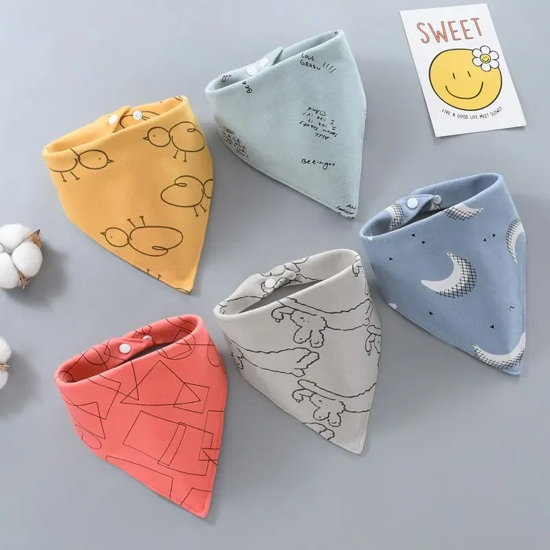 Five yellow cotton baby bandana bibs with waterproof, absorbent material and cartoon unisex designs for feeding and drooling.