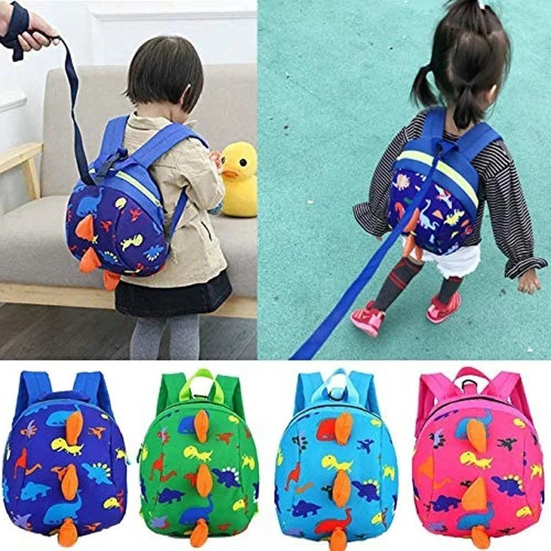 Green toddler dinosaur safety harness backpack with detachable leash, designed for preschool children to prevent loss.