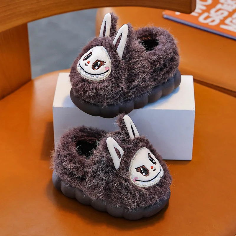 FanzyMarket kids winter plush slippers with warm faux fur, cotton lining, and anti-slip soles for girls and boys indoor use.