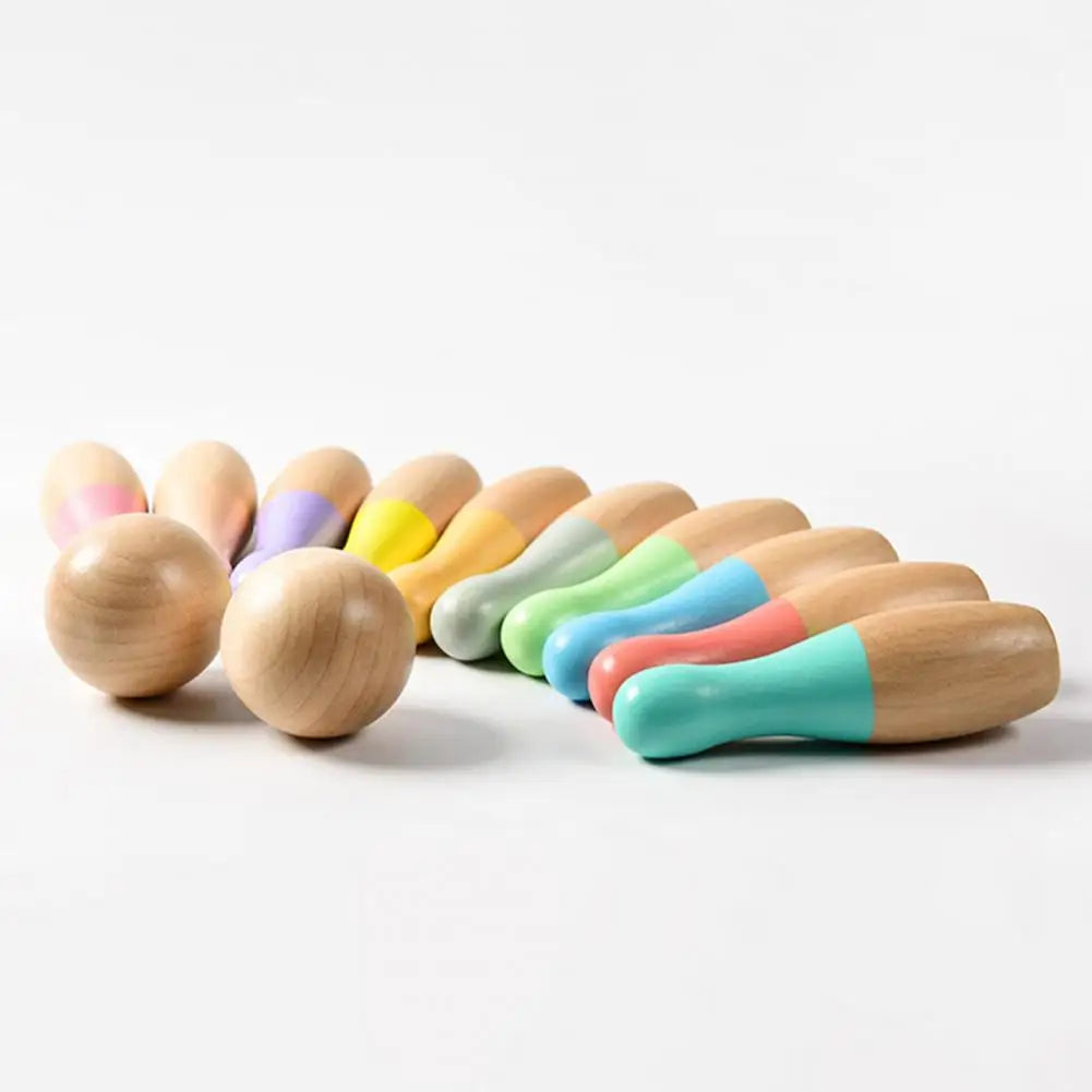Wooden Kids Bowling Set by FanzyMarket with 10 pins and 2 balls, ideal for indoor and outdoor toddler play.