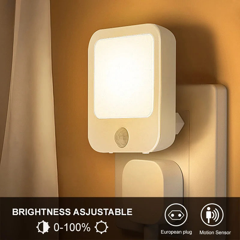 FanzyMarket motion sensor LED night light with EU plug, warm white light, ideal for bedside or kids' rooms, plug-in lamp.