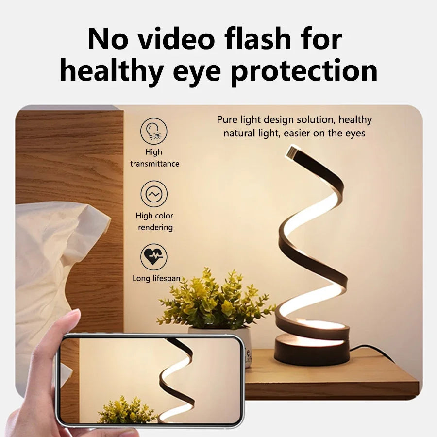 FanzyMarket USB plug-in spiral LED night light with dimmable 3-color adjustable bedside lamp in a modern bedroom setting