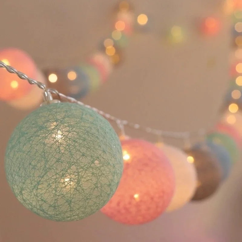 FanzyMarket 10/20/30 LED cotton ball string lights with USB and battery power, ideal for home, wedding, party, or Christmas decorations.