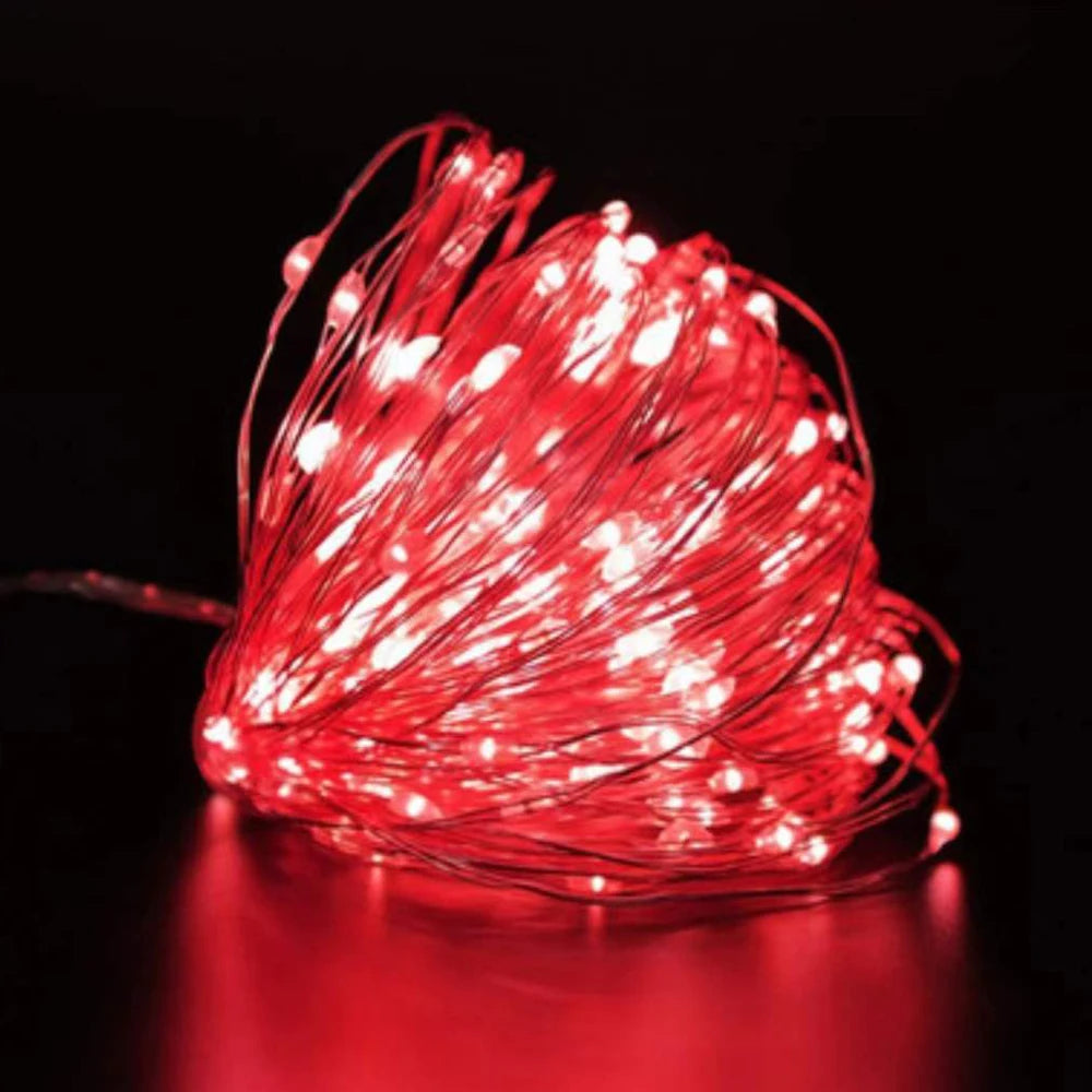 FanzyMarket waterproof battery-operated LED copper wire fairy lights in white, 2m length, suitable for wedding, party, or Christmas decorations.