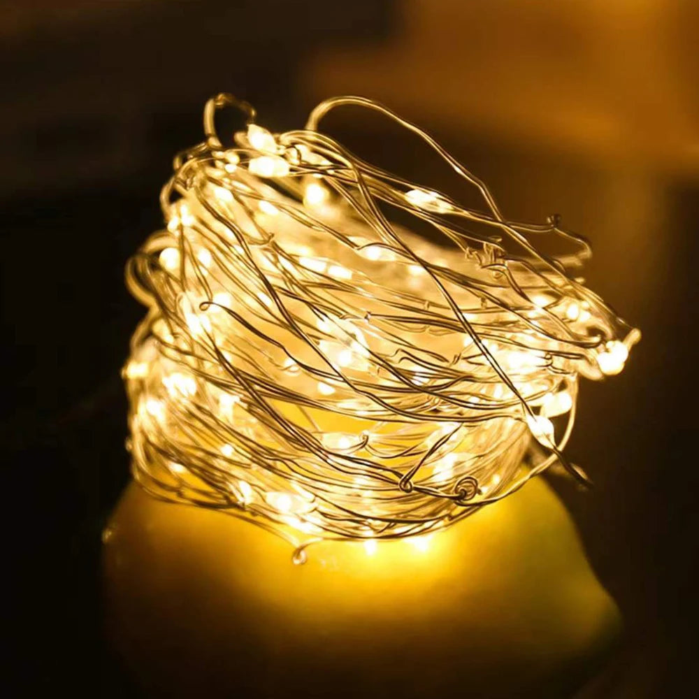 Waterproof LED copper wire fairy lights by FanzyMarket, 2m white string lights for weddings, parties, Christmas, and DIY decor.