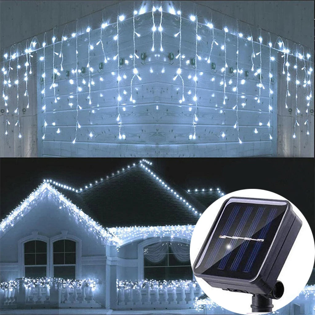 FanzyMarket solar curtain icicle fairy string lights, 3.5m waterproof outdoor decor for wedding and Christmas garden lighting.