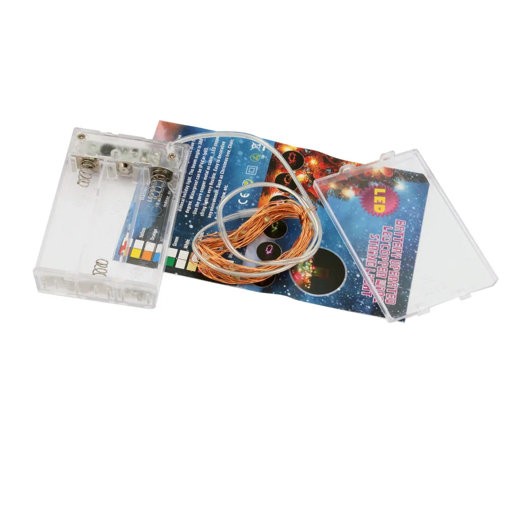 FanzyMarket battery-operated 2m copper wire fairy string lights with 20 LEDs, white color, timer function, ideal for wedding and holiday decor.