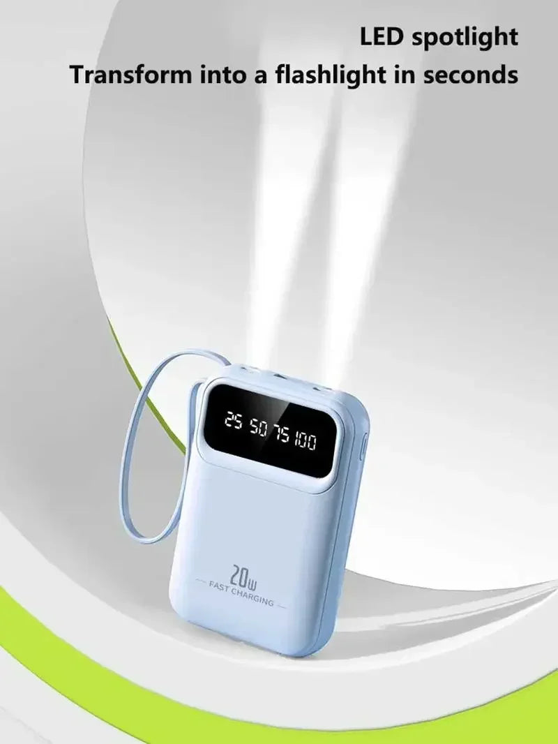 FanzyMarket 500000mAh portable power bank with 20W fast charge, built-in 4 cables, LED light, and digital display in black.