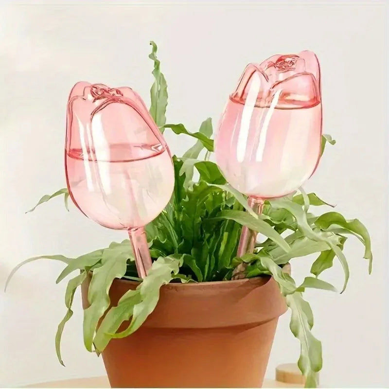 Pink Tulip self-watering plant globe by FanzyMarket, automatic indoor and outdoor dripper, 9.4 inches tall, ideal for home and garden.