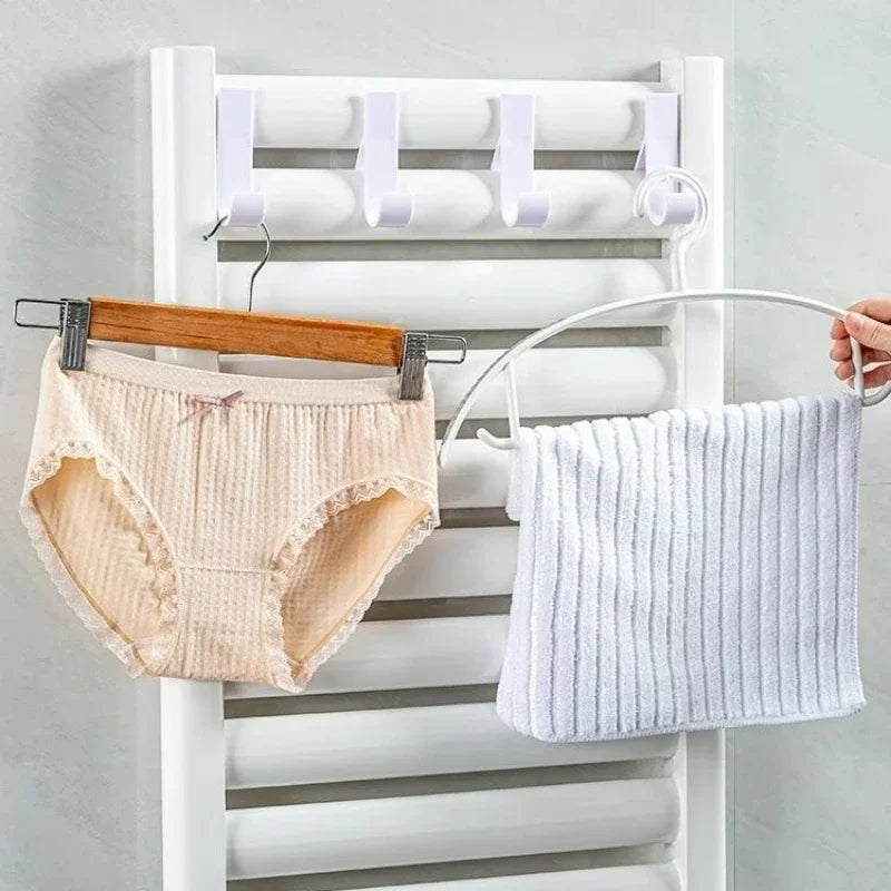 FanzyMarket heated bathroom towel radiator hooks and clips for hanging towels, scarves, and clothes on the radiator rail.