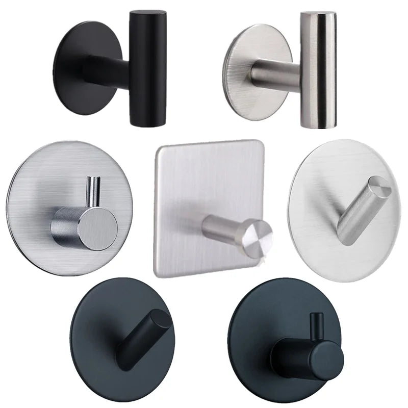 FanzyMarket stainless steel bathroom hardware set with towel rack, toilet paper holder, and hook in polished silver.
