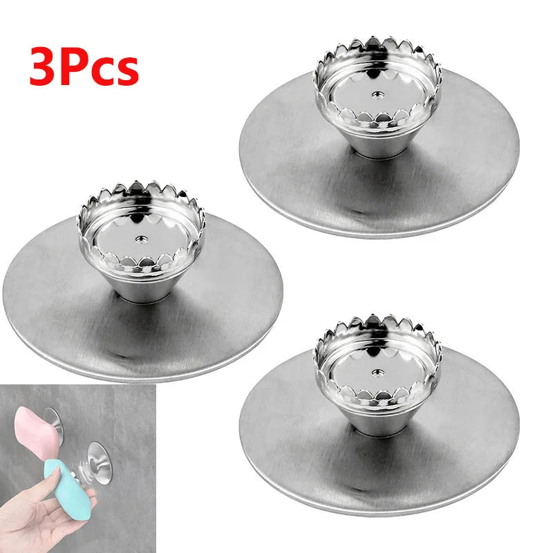 Magnetic stainless steel soap holder with a suction cup for nail-free wall mounting, designed to keep soap dry.