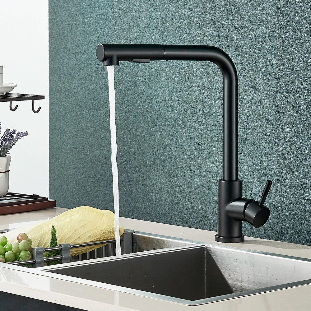 Black pull-out kitchen faucet with single handle and retractable spray, deck-mounted mixer tap for hot and cold water.