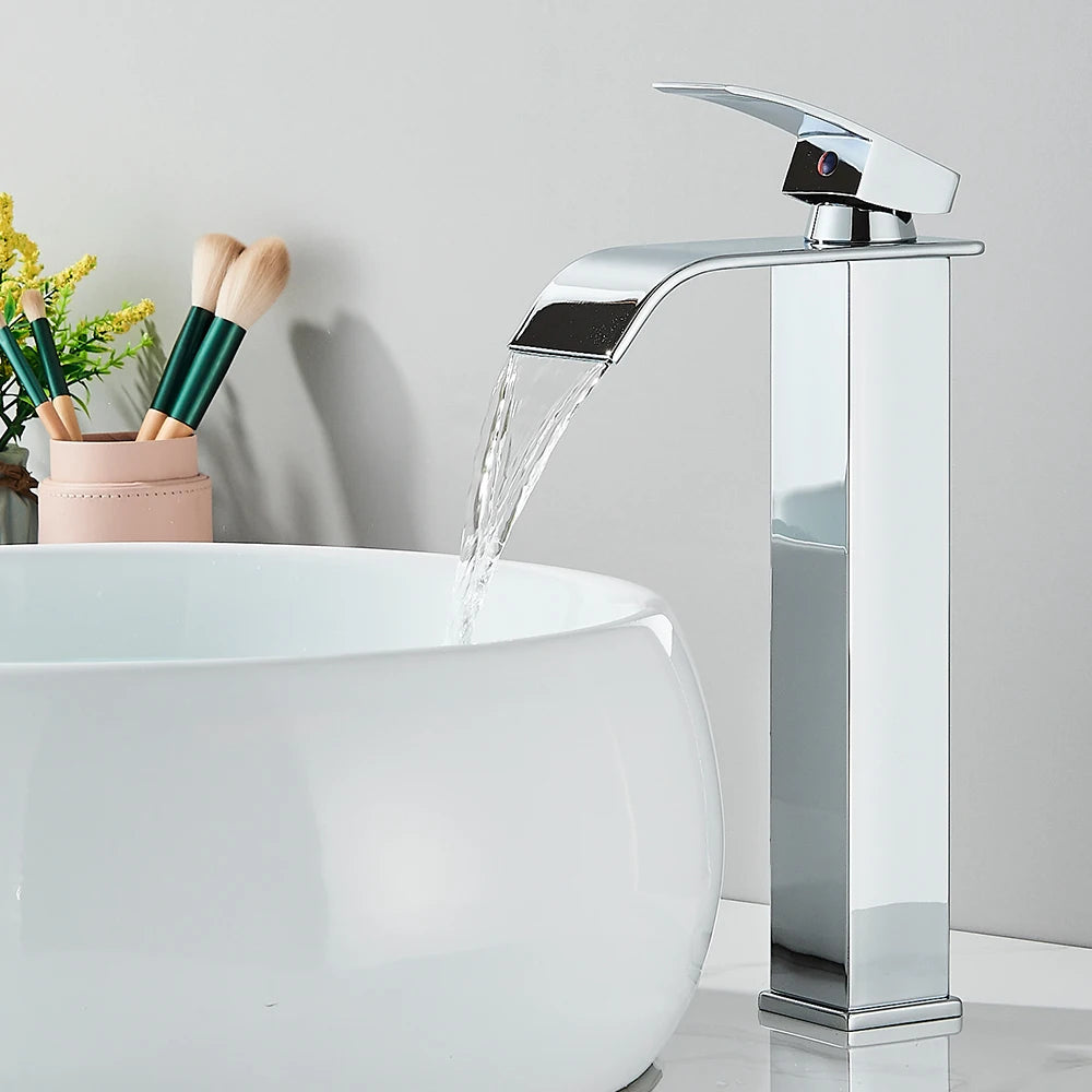 Matte black waterfall basin faucet by FanzyMarket, deck-mounted single-handle mixer tap for bathroom sink with hot and cold water.