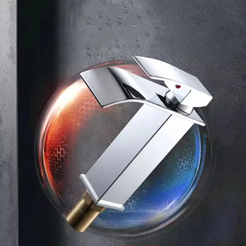 Stainless steel deck-mounted bathroom basin faucet with hot and cold handles in classic style, by FanzyMarket.