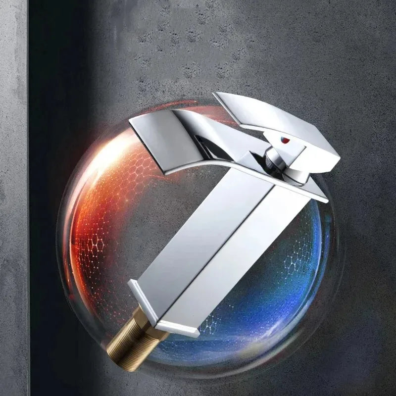 Black waterfall bathroom basin faucet by FanzyMarket, stainless steel deck-mounted high-low mixer tap with hot and cold water controls.